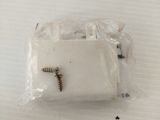 two screws in a plastic bag on a white surface