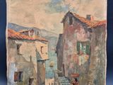 an oil painting of a street scene on a easel on a blue background