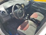 a small car with the door open and a steering wheel in it