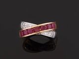 a ruby and diamond crossover ring