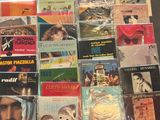 many different types of music cds on the table