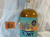 a bottle of rum that is sitting on a table