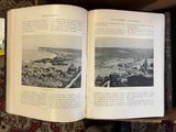 an open book with pictures of a city in it