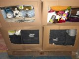 two cardboard boxes that have various items in them