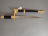 two knives that are sitting on a table
