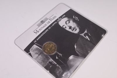 l'image d'une pièce de monnaie sur laquelle figure l'effigie d'un homme en costume