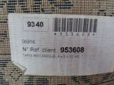 a close up of a label on a chair that has a barcode on it