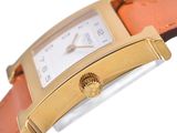 an image of a close up of a wrist watch on a white surface