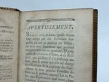 an open book with a picture of a bird on it