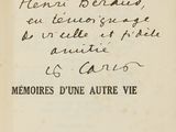 an old book with a handwritten inscription on it