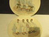 two plates with a picture of a man sitting on a bench