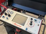 a portable gas grill with a digital display on it