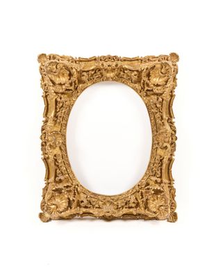 an ornate gold frame with a white background and a white background