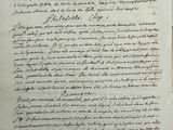 an old manuscript with writing on it and black ink