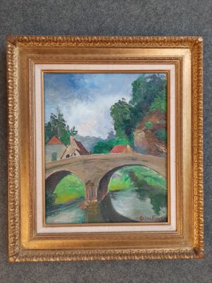 une peinture à l'huile représentant un pont enjambant une rivière, dans un cadre doré