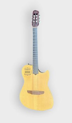 yellow acoustic guitar on a white background with copy space for your text