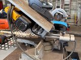 a machine that is sitting on a table in a garage
