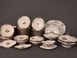 many plates and bowls that are stacked on top of each other