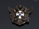 a close up of a badge on a black surface