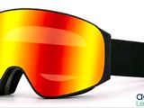 an image of a pair of ski goggles sitting on top of a white surface