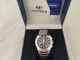 a watch that is in a box on a table
