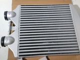 a close up of a intercooler on top of a cardboard box