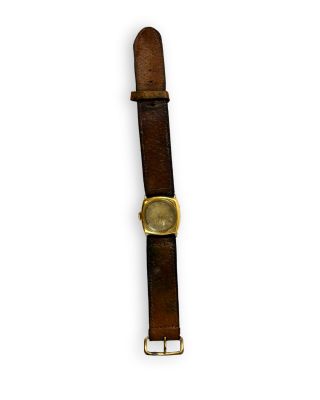 brown leather watch strap with a gold plated watch face