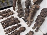 many different types of wood carvings on the table