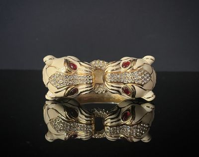 bracelet manchette plaqué or orné de pierres rouges et blanches