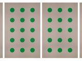 a set of four green polka dot stickers on a white background