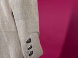 a beige suit on a mannequin mannequin mannequin mannequin mannequin mannequin mannequin mannequin mannequin