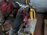 a scooter that is parked in a garage