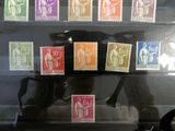 a picture of a display case with stamps on it