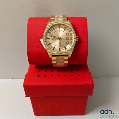 michael korsch watch in a red box on a white surface