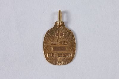 an image of a gold medal on a white surface
