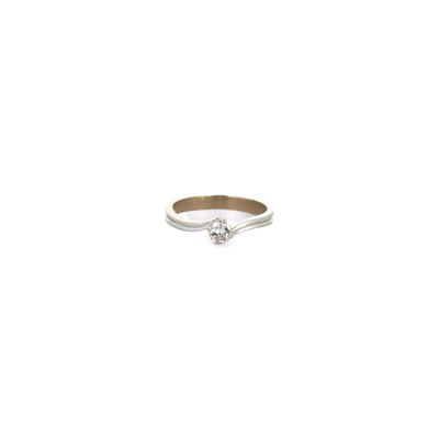 a close up of a diamond ring on a white background