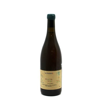 the bottle of wine is empty on a white surface