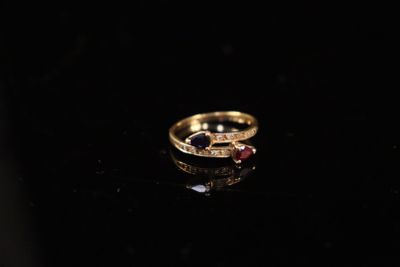 Bague en or jaune 18 K (750) sertie d'un saphir et rubis tai…