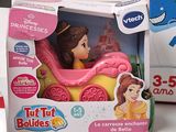 two toys that are in a box on the table