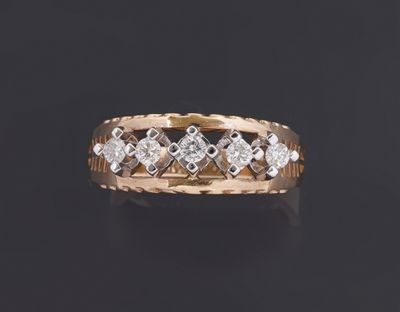 a gold and diamond ring