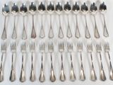 a lot of silver spoons and forks on the table