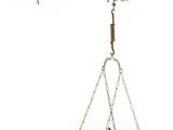 an image of a scale with chains hanging from it ' s sides