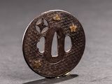 a small metal object that is sitting on a table