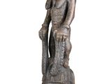 statue of a man with a helmet on his head and a sword in his hand