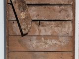 a piece of wood that has been left on the wall