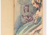 un vieux livre sur lequel figure le dessin d'une femme se regardant dans un miroir