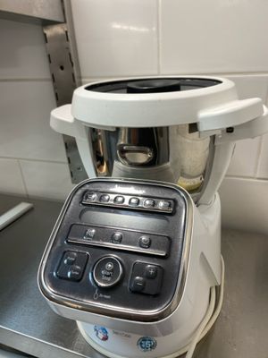 a blender sitting on top of a counter in a kitchen