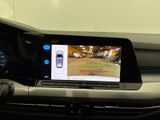 a picture of a car ' s rear view mirror with a camera attached to it