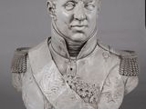 bust of a man in a military uniform on a pedestal