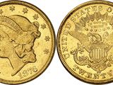 a gold coin with a woman ' s head and eagle on it